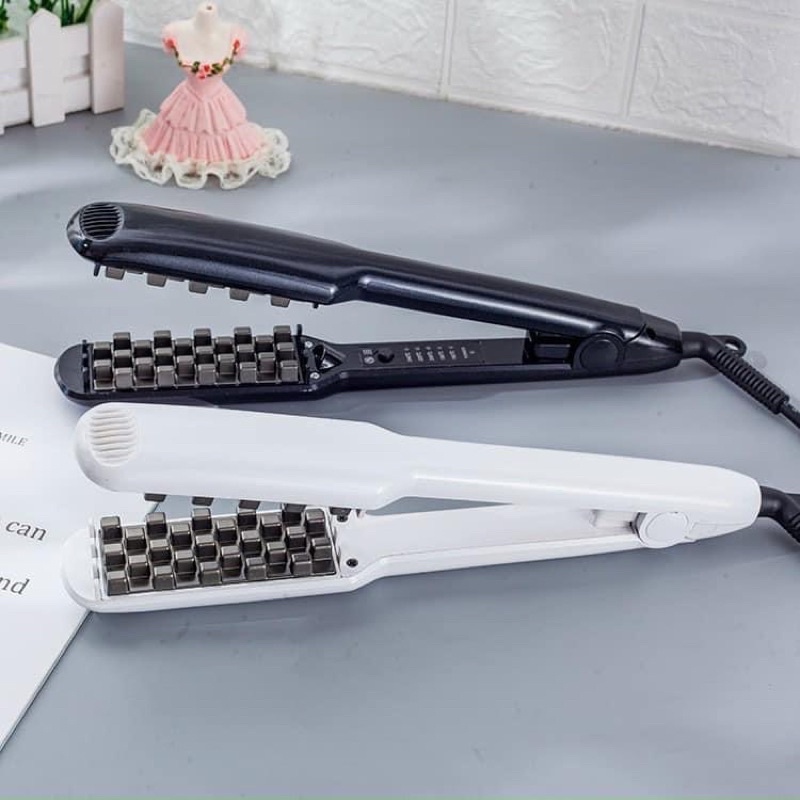 Máy dập phồng chân vuông