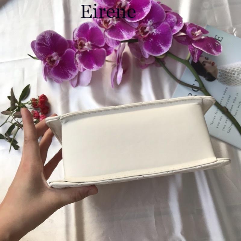 Túi Nữ  Bốn Đinh Dạng Trám Sẵn Hai Màu Đen Và Trắng