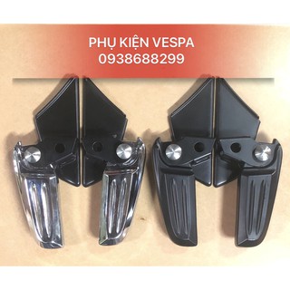 Gác chân vespa có nút bấm