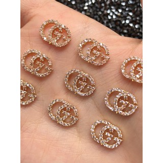 Charm thương hiệu to đính móng chân mã D