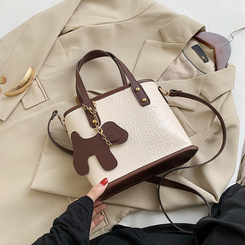 Túi xách thiết kế giản dị thời trang sành điệu cho nữ