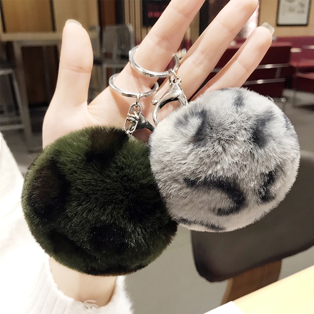 Móc Chìa Khóa Hình Trái Tim Họa Tiết Da Báo Phối Cục Bông Xinh Xắn