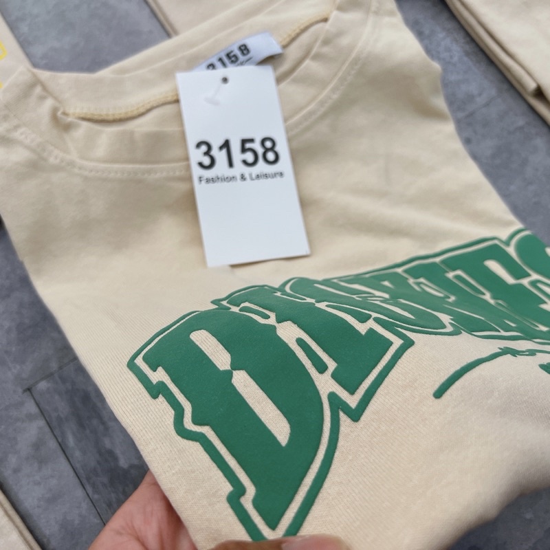 Áo phông tay lỡ Quảng Châu 3158 IN CHỮ NỔI, in thường( MÀU BE SỮA )