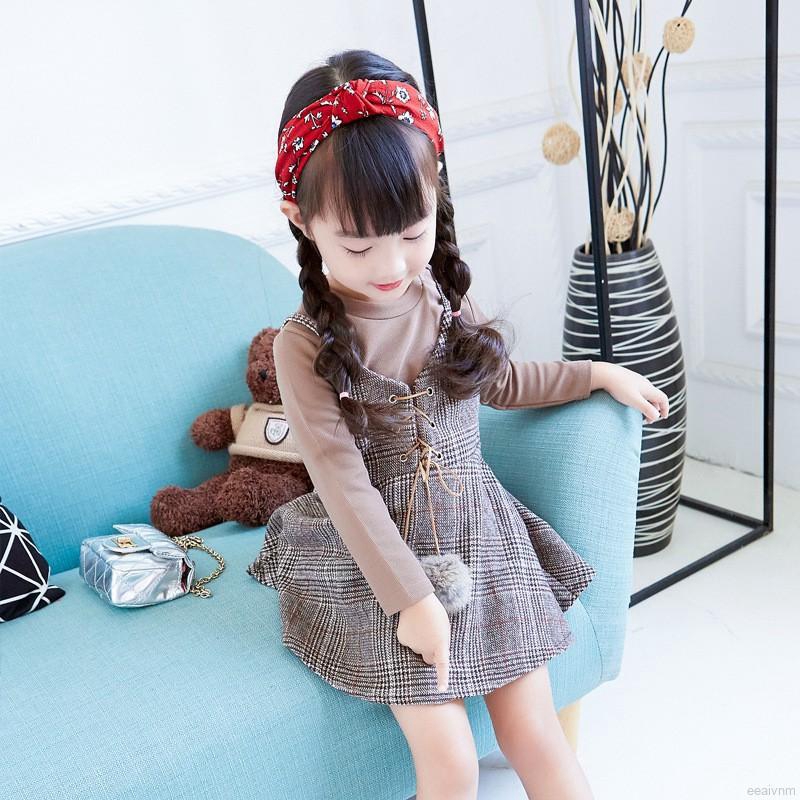 Bộ yếm sọc có dây thắt cục bông xinh xắn phối áo thun tay dài sáng màu thời trang cho bé gái