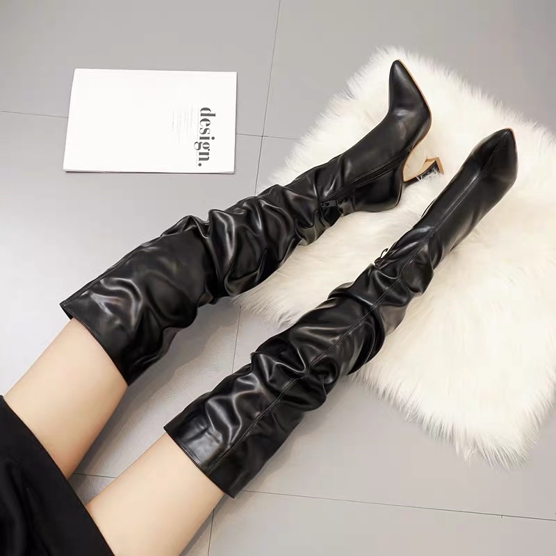 Boot đùi nhún cao gót mũi nhọn