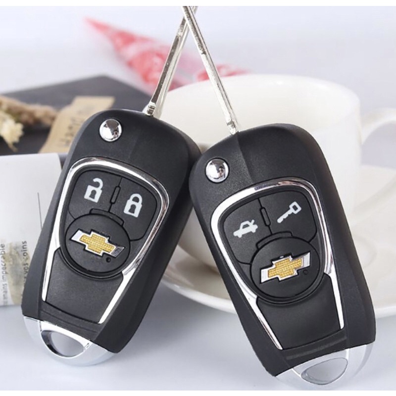 Vỏ độ gập chìa khoá xe Chevrolet Aveo Spark Vivant 2 nút bấm như hình chuẩn zin