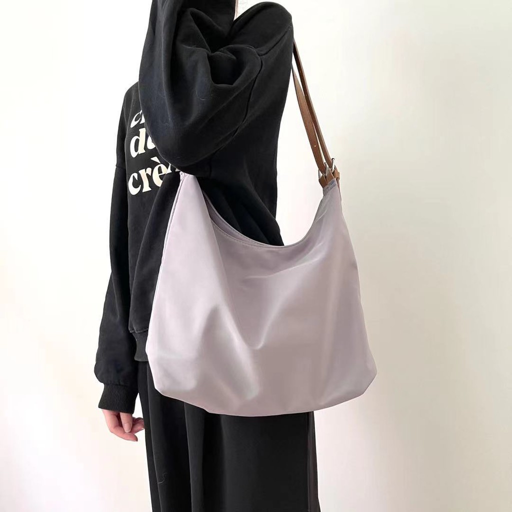 Túi đeo chéo một bên vai làm từ vải oxford thời trang cho nữ