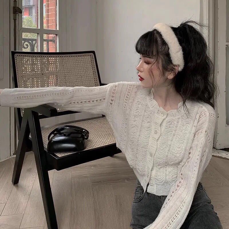 Áo Khoác Cardigan Dệt Kim Khoét Lỗ Đính Hạt Ngọc Trai Phong Cách Hàn Quốc Mới Cho Nữ