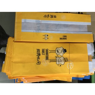 bịch 100 Túi đựng bánh mì hoa cúc gối Màu vàng cỡ 12x31cm dọc đựng bánh 250-350g