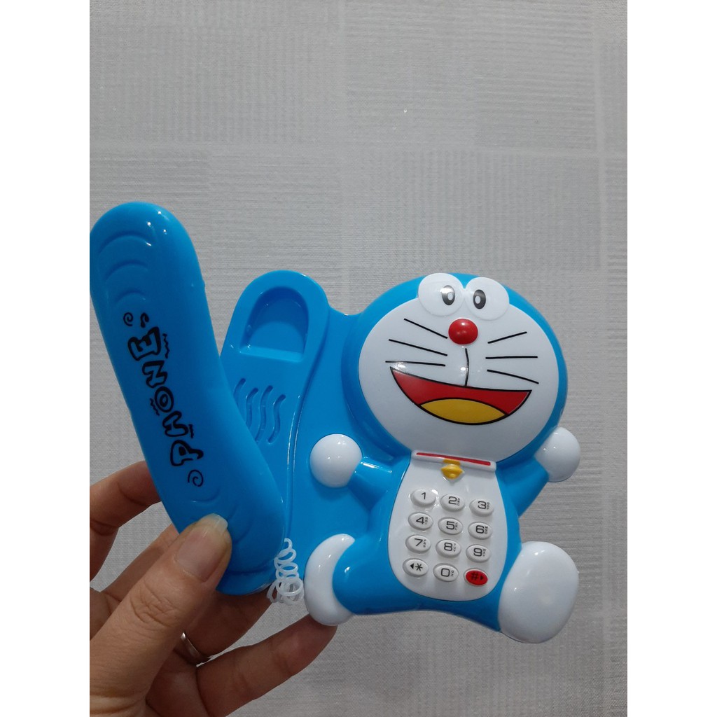 Đồ Chơi Phát Nhạc Kiểu Dáng Điện Thoại Bàn Hình Doraemon Dễ Thương Cho Bé (Tặng Kèm Pin)