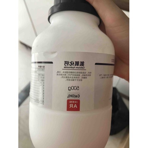 Hóa chất Calcium hydroxide Xylong CAS 1305-62-0 Ca2 lọ 500g canxi hidroxit