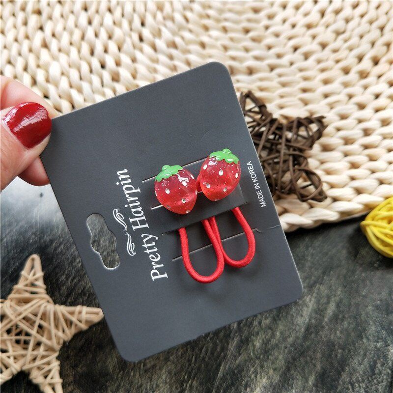 Set 2 kẹp tóc/ 2 Dây buộc tóc hình trái dâu dễ thương cho bé gái