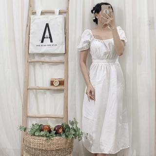 Đầm trắng chéo lưng
