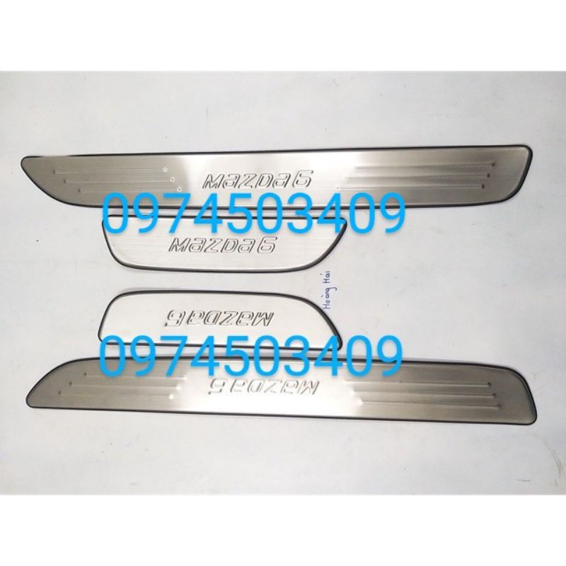 Ốp bậc bước chân ngoài Mazda 6