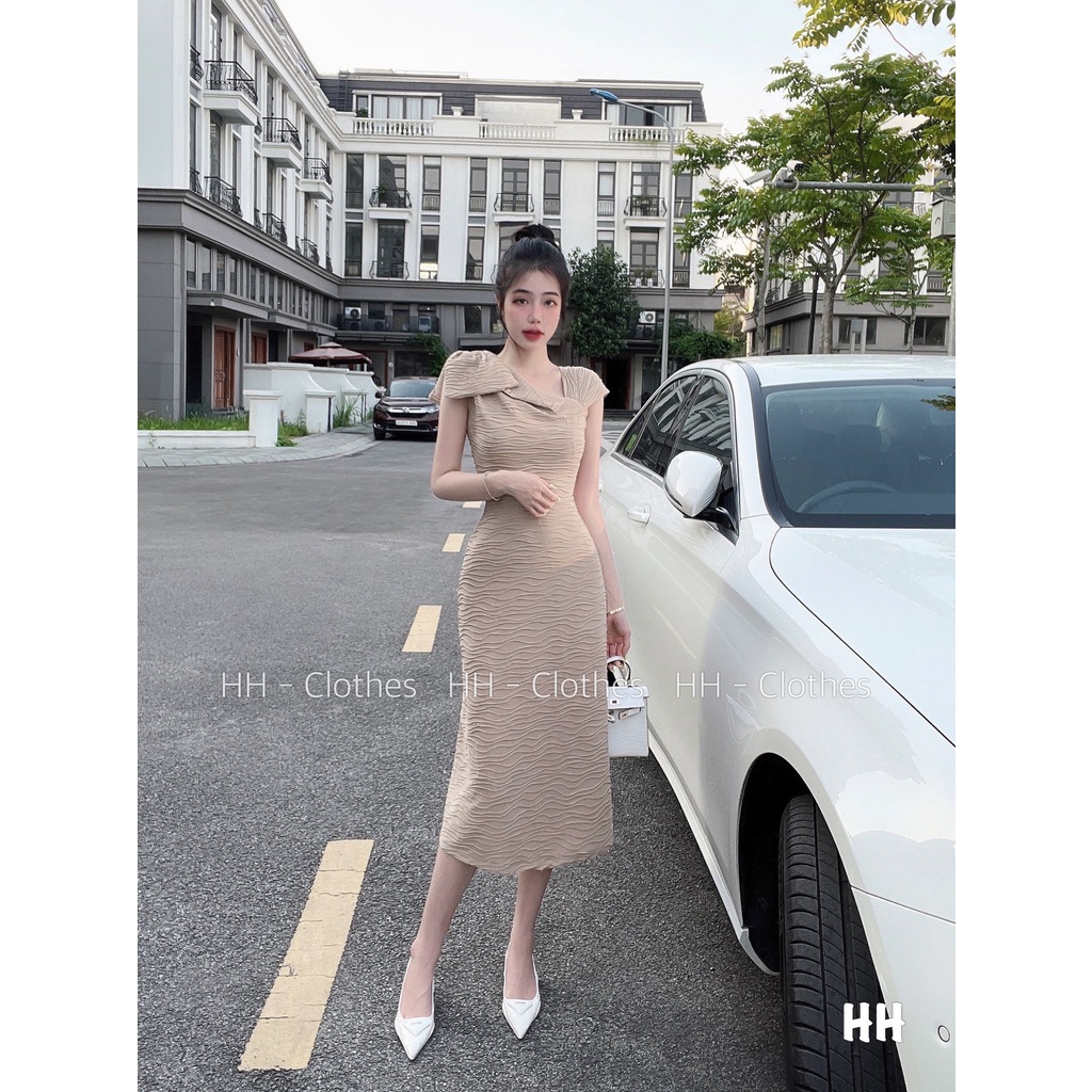 Váy xốp sóng lệch vai nơ