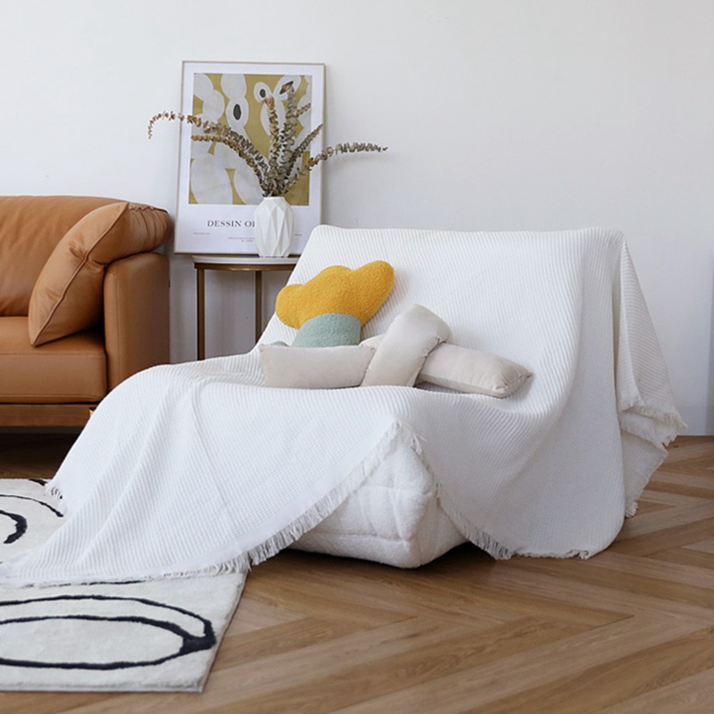 Chăn phủ sofa mềm mại phối tua rua xinh xắn