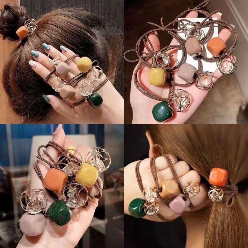 Cột tóc 2 quả sang chảnh cho nữ