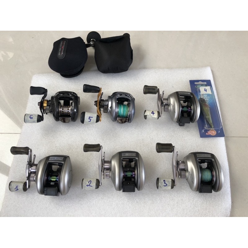 máy câu ngang shimano daiwa