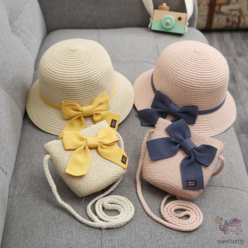 Set mũ vành và túi xách đan cói đính nơ thời trang mùa hè đáng yêu cho bé gái
