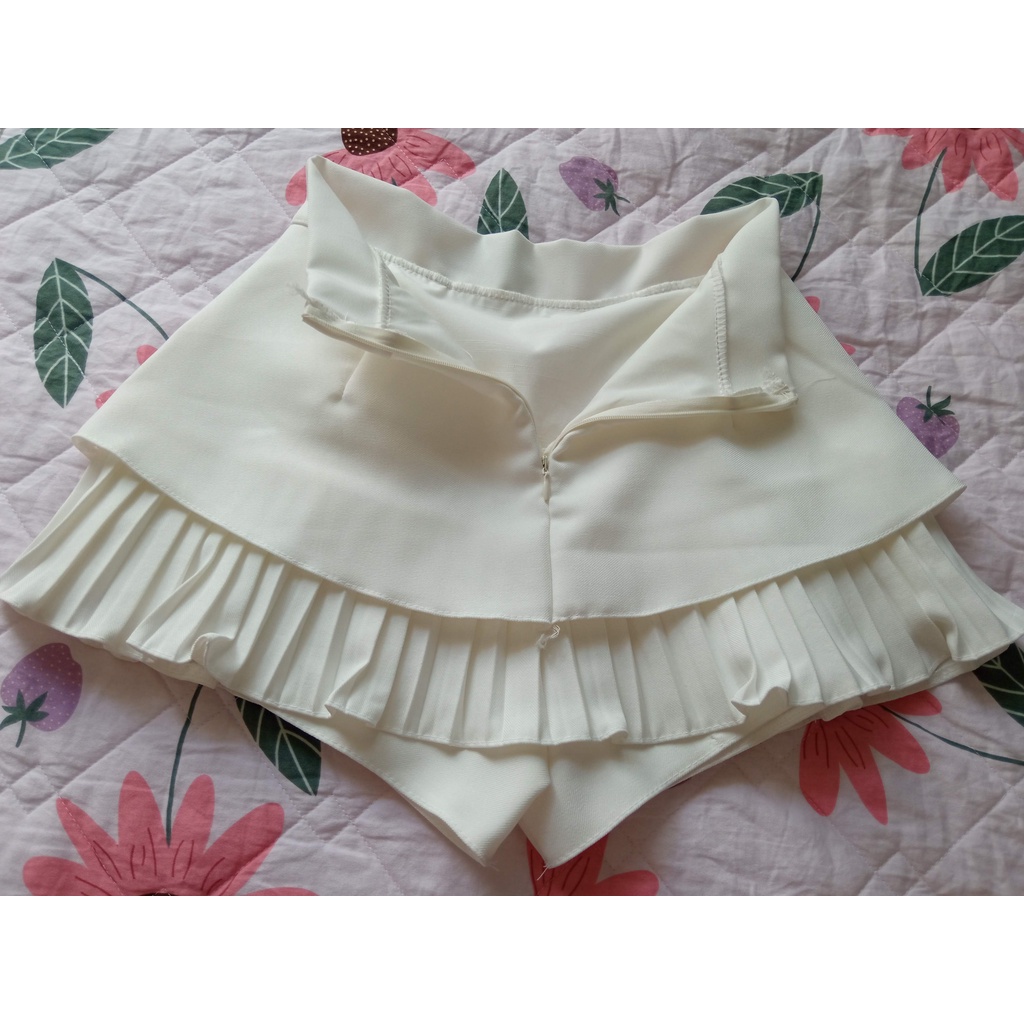 Chân váy xếp ly 2 tầng dập vải tuyết mưa