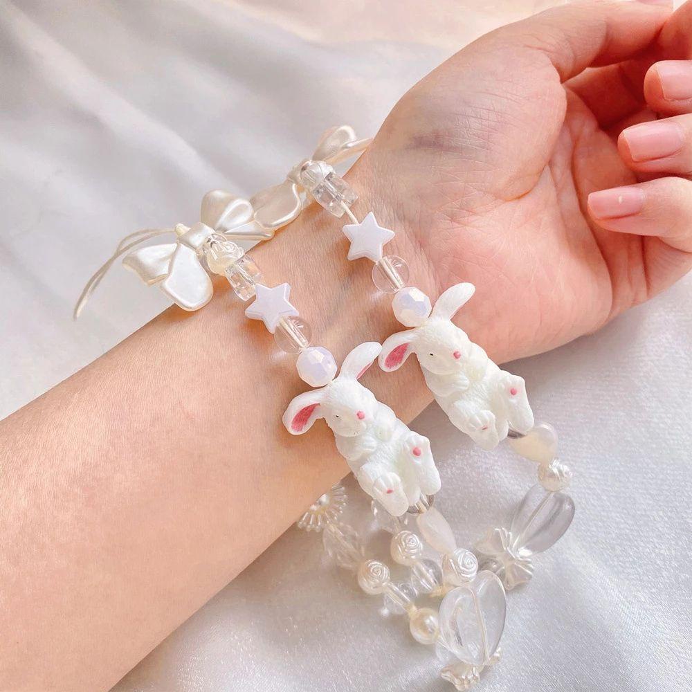 Ốp Điện Thoại Họa Tiết Hoạt Hình Gắn Dây Đeo Cổ Tay Làm Vòng Đỡ Và Dây Treo Xỏ Hạt