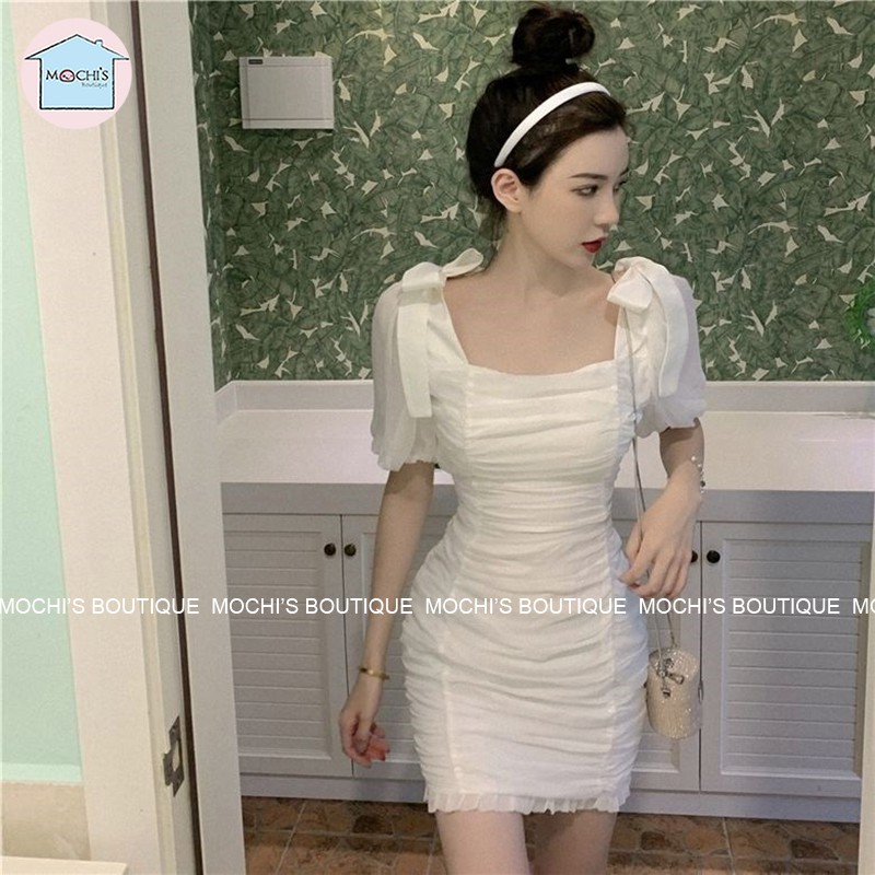 Đầm body dáng ngắn màu trắng nhún eo che khuyết điểm, mẫu váy đầm trắng cổ vuông tay phồng thắt nơ điệu đà-M065 | BigBuy360 - bigbuy360.vn