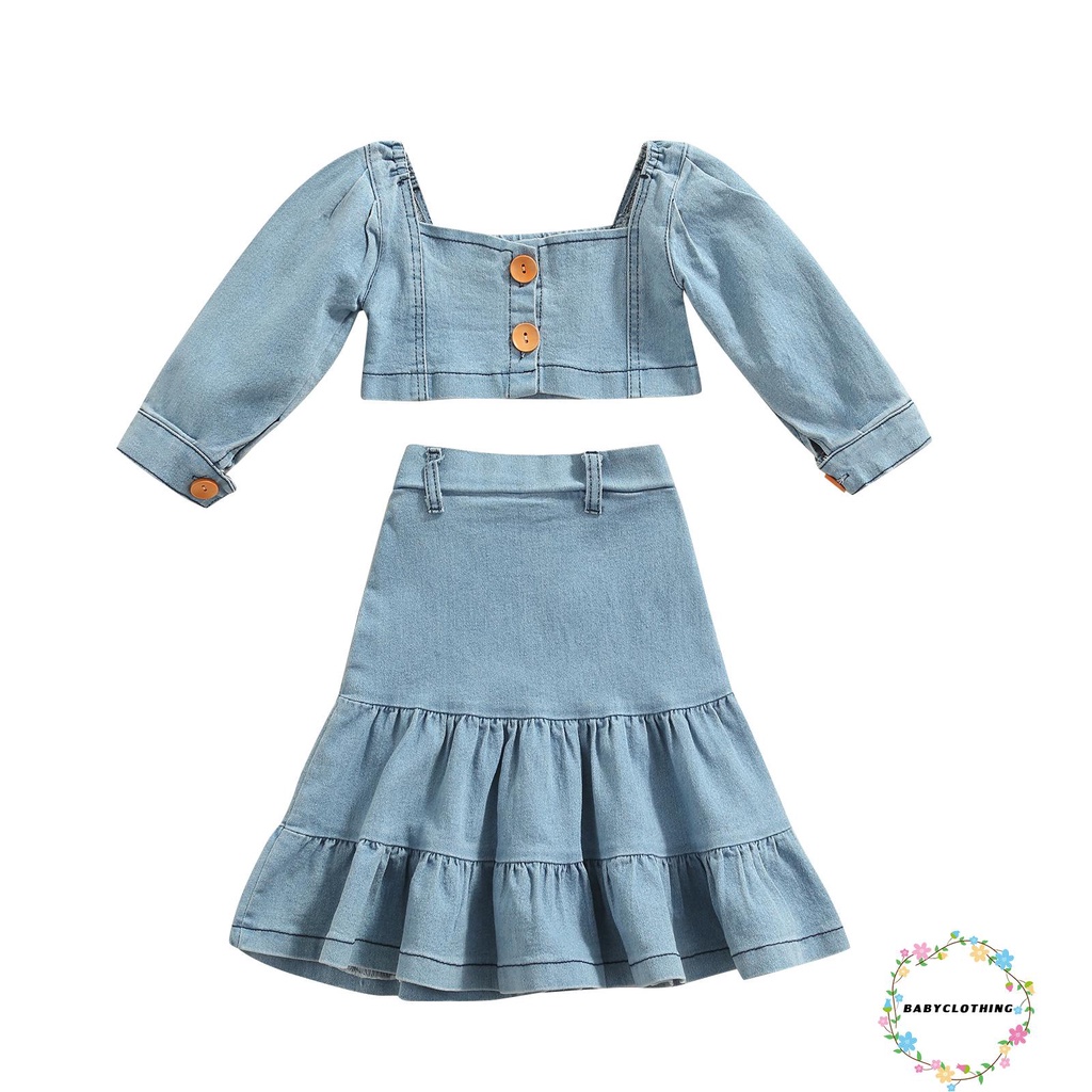 Set trang phục 2 món gồm áo croptop tay phồng cài nút + chân váy jean cho bé gái đi dạo