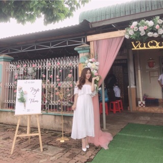 Đầm maxi trắng trễ vai