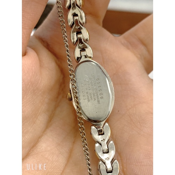 Đồng hồ si nữ hiệu SEIKO, dáng lắc, dây demi, mặt khảm trai
