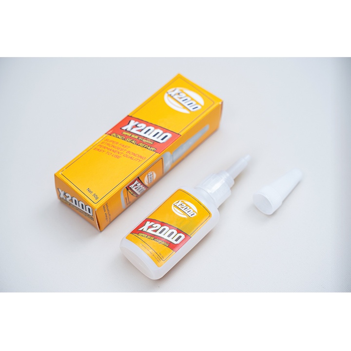 Keo Dán X2000 Siêu Dính, Keo Dán Đa Năng Dán Tất Cả Vật Liệu Bằng Gỗ, Vải, Gốm Sứ, Nhựa An Toàn Với Da Tay (Dạng nước)