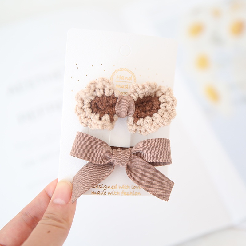 Set 2 kẹp tóc nơ họa tiết chấm bi xinh xắn cho bé gái