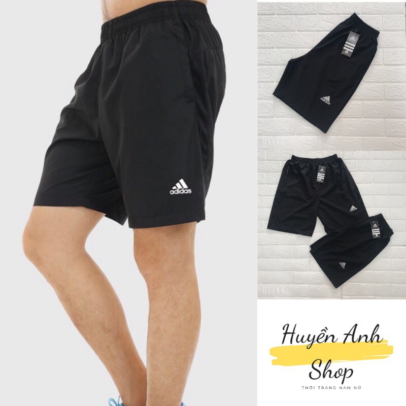 Quần đùi Nam/ Quần Short Nam Logo Thêu Chất Gió Thoáng Mát Freesize Màu Đen