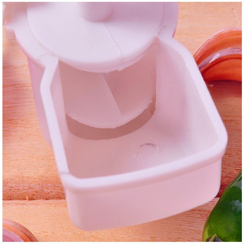 Dụng cụ nghiền gừng tỏi dạng xoay tiện lợi