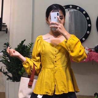 Áo cúc bọc peplum