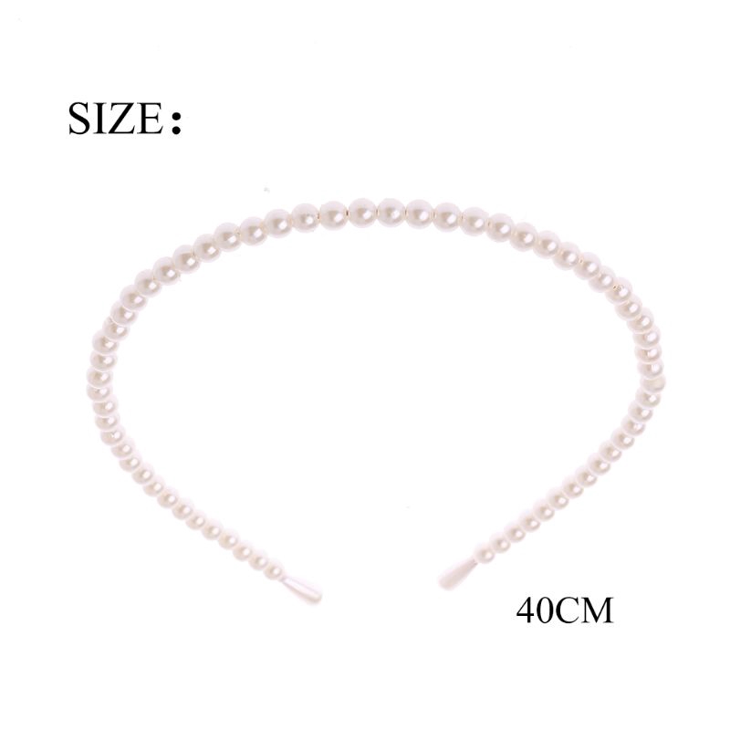 Thun cột tóc gắn ngọc trai sáng tạo