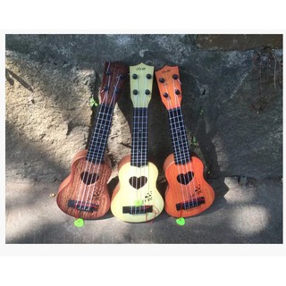 Đàn Ghi Ta Ukulele Cho Bé