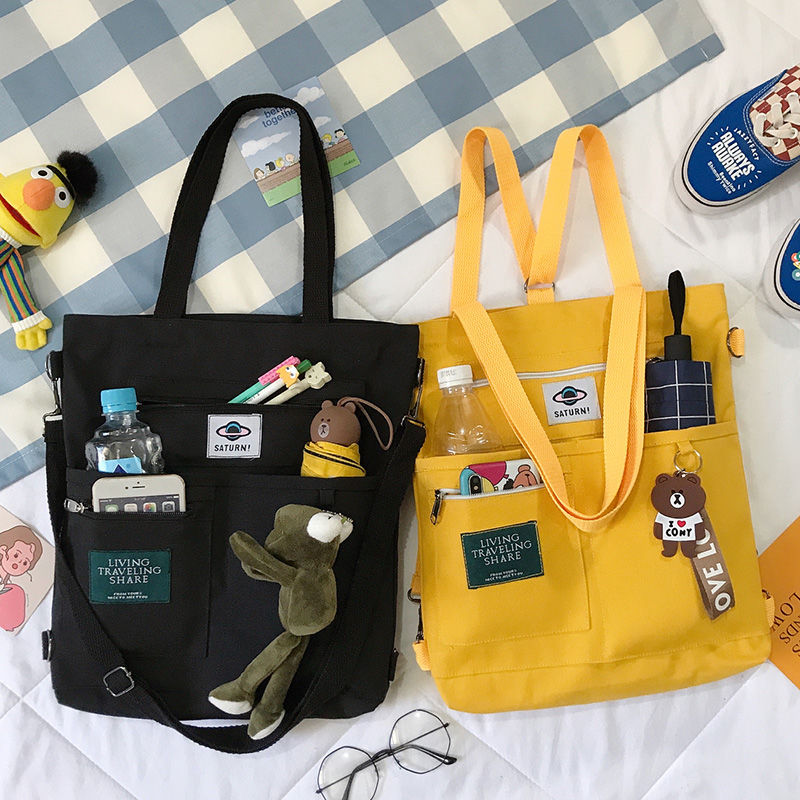 Korean version one-shoulder all-fit female multi-function canvas tote bag large capacity student backpack