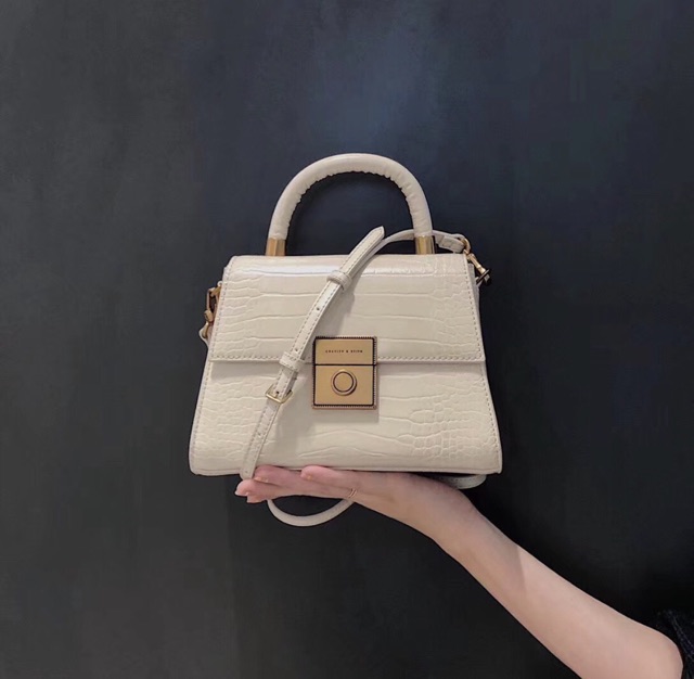 Túi C.K vân rắn quai cầm tay khuy vuông  mẫu mới 2020. Ảnh chụp thật