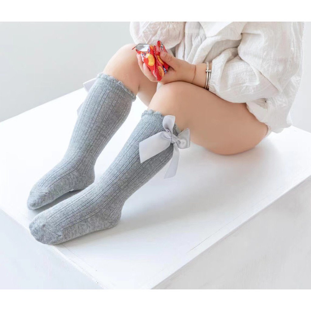 Tất dài đính nơ chống trơn dành cho bé gái