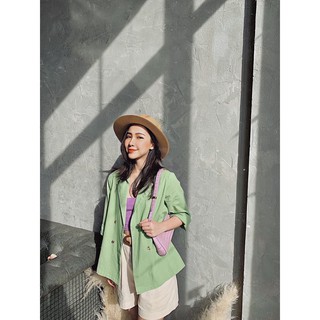 Set áo vest xanh quần short kem