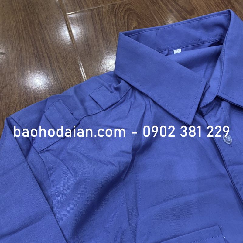 Áo bảo vệ vải Kate Mỹ tay dài màu xanh nước biển logo tay