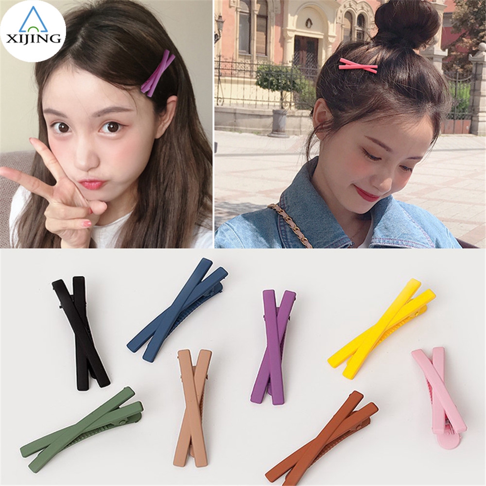 Kẹp tóc hình chữ X màu trơn ngọt ngào và thời trang cho nữ