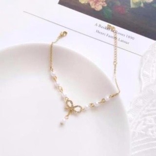 Vòng đeo tay mặt thiết kế hình nơ ngọc trai thời trang dành cho nữ