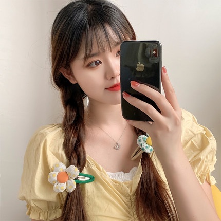 Kẹp tóc hình hoa dễ thương dành cho bé gái