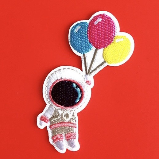 Sticker ủi hình phi hành gia