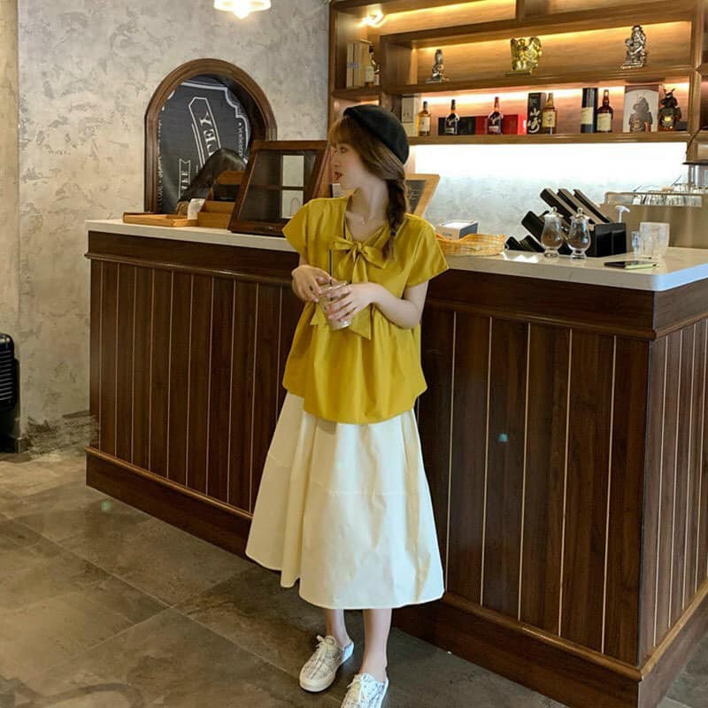 Set áo babydoll nơ kèm chân váy dài có lót như hình