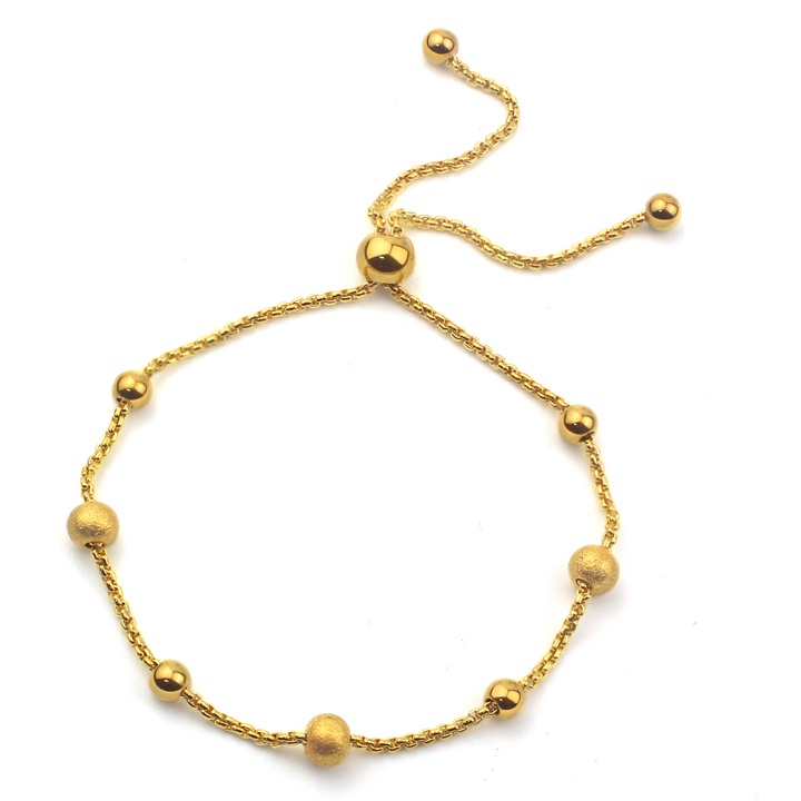 Lắc tay nữ cao cấp titan kiểu bi dây rút màu vàng siêu đẹp, bền màu, sang trọng, quý phái