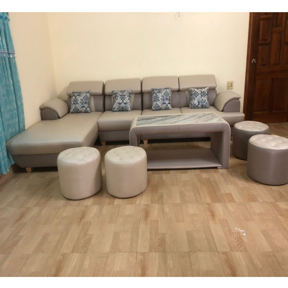 Bộ bàn ghế sofa da phong khách cao cấp bao gồm 1 ghế sofa góc L + 1 bàn gỗ + 2 đôn