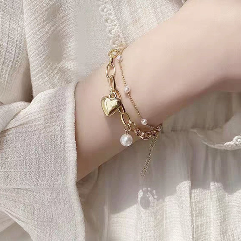 Vòng Tay Hai Lớp Đính Ngọc Trai Hình Trái Tim Thời Trang Sang Trọng Cho Nữ