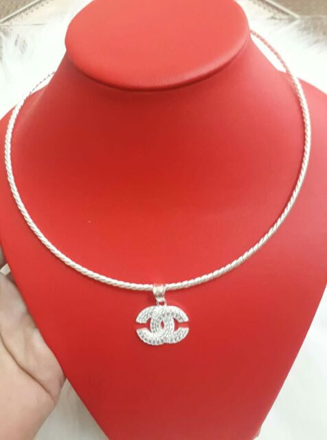 KIỀNG CỔ BẠC MẶT X